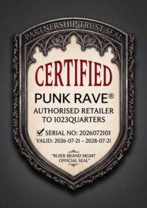 Official gothic shield-shaped trust seal stating: CERTIFIED Punk Rave® Authorised Retailer TO 1023QUARTERS®. It includes Serial NO: 2026072101 and a Validity period from 2026-07-21 to 2028-07-21, issued under the Ruier Brand Mgmt Official Seal. This badge confirms 1023Quarters sells genuine Punk Rave alternative apparel.
